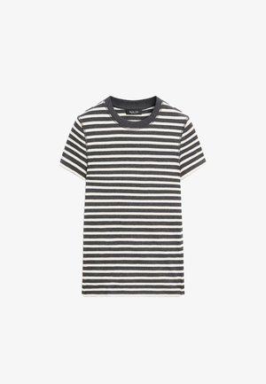 Maglietta a maniche corte con scollo rotondo e righe orizzontali bianche e nere, distesa su uno sfondo bianco.