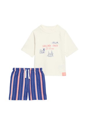 Cream short-sleeve shirt with boat drawings and "Sailing Free St Ives" text, paired with blue, white, and coral striped shorts with drawstring.