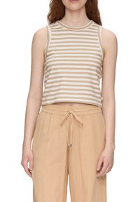 Prúžkovaný, bezrukávový crop top v béžovej a bielej farbe. Mäkká tkanina s okrúhlym výstrihom. Skombinované so svetlobéžovými nohavicami na šnúrku.