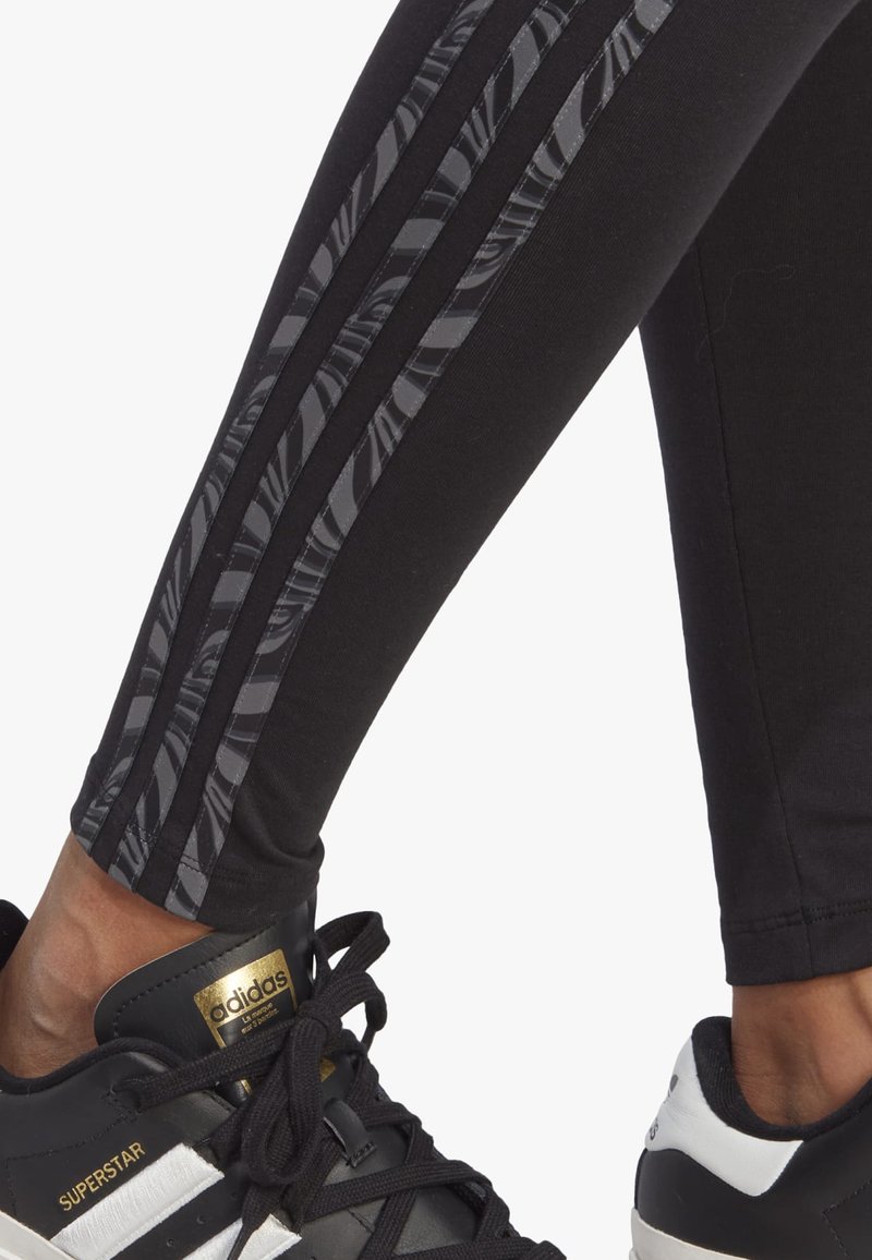 adidas gazelle silver green womens Miami Hurricanes adidas Women's Fresh Tight Pants - Black main image 0