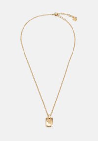 Seleccionado, gold-coloured