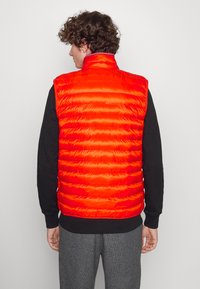 Tommy Hilfiger PACKABLE VEST - Colete - acid orange