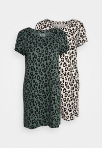 Two short-sleeve dresses: one in green with black leopard print, the other in cream with black spots. Soft cotton material, relaxed fit.