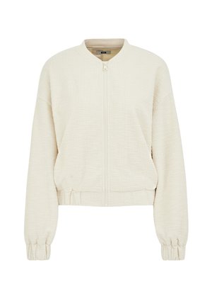 Skraćena bomber jakna krem boje. Teksturirani materijal s patentnim zatvaračem sprijeda, rebrastim manšetama i okruglim ovratnikom. Ima detalj nabrane struk trake.