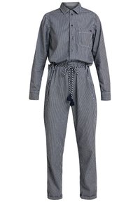 Marinblå randig jumpsuit med långa ärmar, knapplinje fram och dragsko i midjan. Har två sidofickor och en bröstficka.