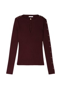 Top lungo bordeaux a maniche lunghe con scollatura a chiave, texture a coste e occhielli metallici decorativi lungo le maniche.