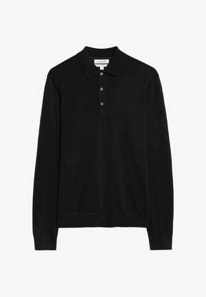 Zwarte longsleeve merinowollen polo met drie knopen en een kraag.