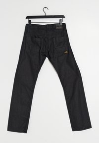 Svarta denimjeans med rak passform, med två bakfickor och en texturerad midja. Ingen synlig märkning på tyget.