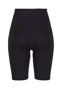 Hoch taillierte schwarze gerippte Biker-Shorts mit einem V-förmigen Nahtdetail auf der Rückseite, das bis zur Mitte des Oberschenkels reicht.