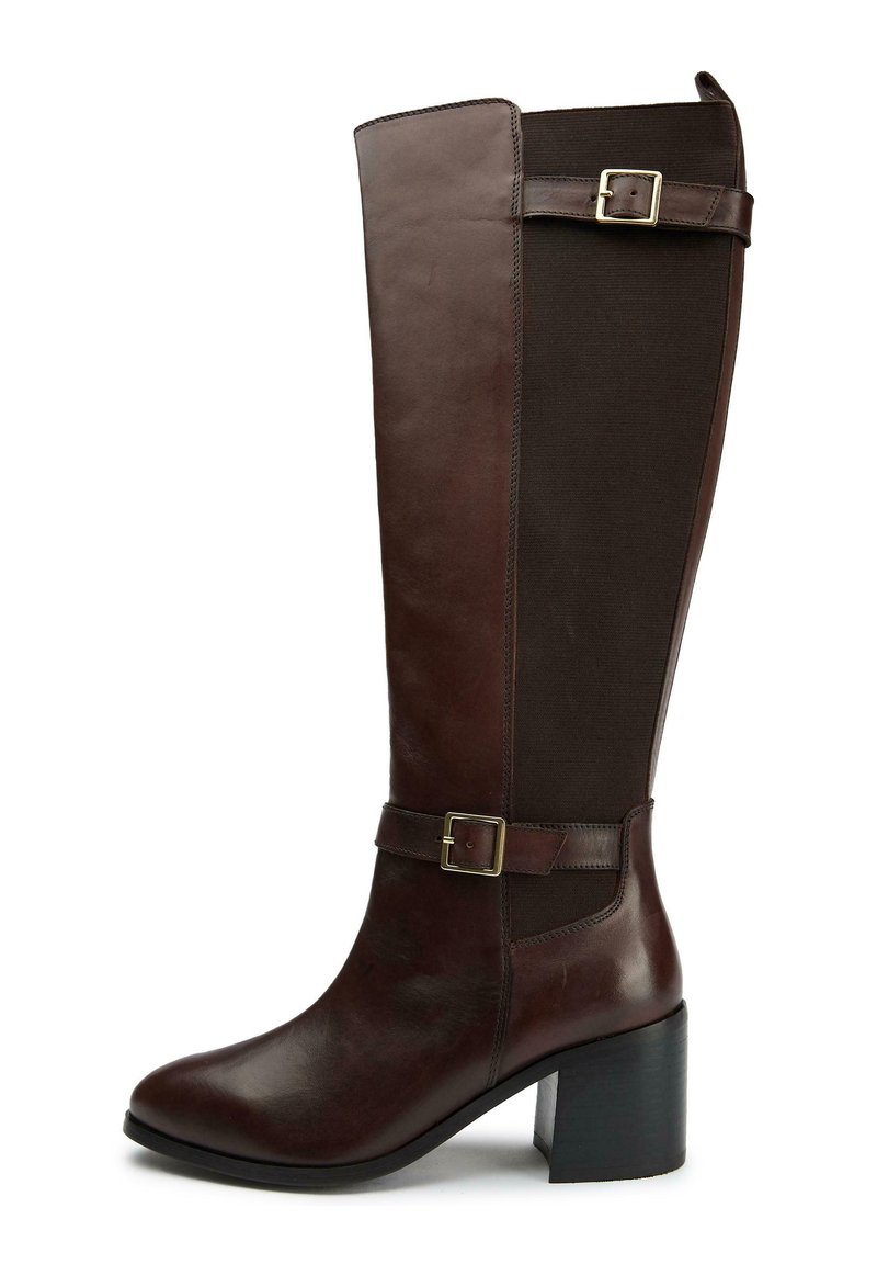 Brown leather knee-high boot with textured elastic side panel, block heel, and adjustable strap with metallic buckle accent.