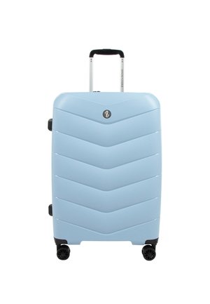 Light blue hard-shell suitcase with a chevron pattern, extended handle, and four black wheels, standing upright against a plain background.