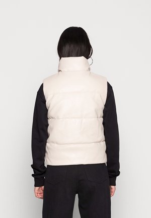 Smanicato - beige