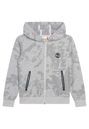 Sudadera con capucha gris claro con cremallera, con un sutil patrón de camuflaje, bolsillos frontales con ribete oscuro y logo del árbol Timberland en el pecho izquierdo.