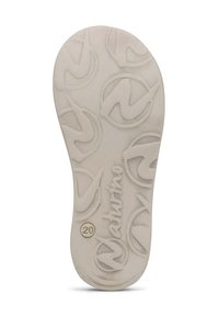Sottopiede in materiale beige chiaro con una superficie testurizzata caratterizzata da motivi circolari e il logo del marchio "Naturiño" impresso vicino al fondo.