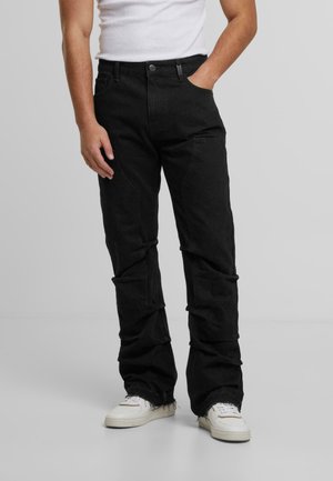 Tiesaus kirpimo džinsai - black