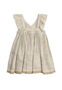 Jasnobeżowa sukienka z falbanami na ramionach, dekoltem w serek i rozkloszowanym dołem z subtelnym nadrukiem liści palmowych oraz kontrastowym obszyciem.
