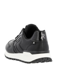Black athletic shoe with a textured leather upper, reinforced heel, and white rubber sole. Features subtle branding and a lace-up design.