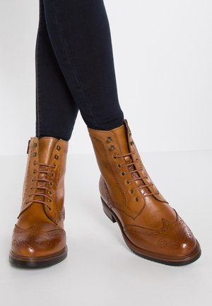 Stivaletti stringati - cognac