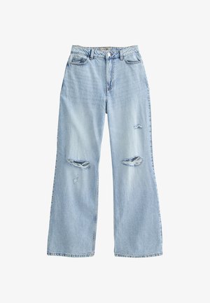Ljusblå vida jeans i denim, med slitna hål på låren, hög midja och standard femficksdesign.