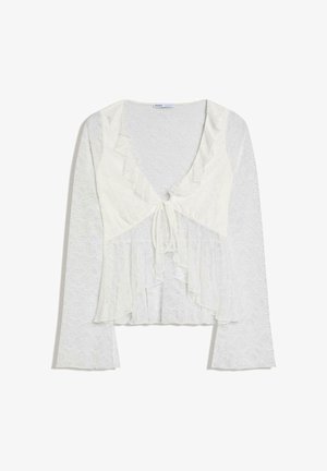 Weiße Spitzenbluse mit langen Ärmeln, Rüschensaum am Ausschnitt und vorderer Bindung, mit einem mehrlagigen, leicht ausgestellten Saum.