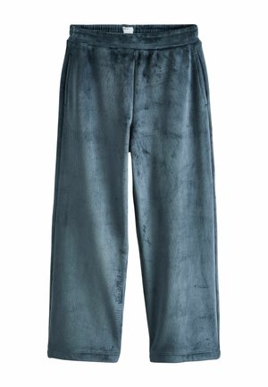 Weiche blaugrüne Velours-Hose mit weitem Bein, elastischem Bund und Seitentaschen, auf weißem Hintergrund dargestellt.