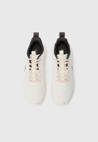 Pair of white athletic shoes with light pink laces, black interior lining, and branded pull tabs, viewed from above on white background.
