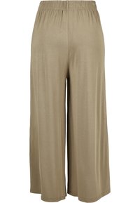 Pantalon ample beige à jambes larges avec taille élastique, coupé à mi-mollet, en tissu doux et léger.