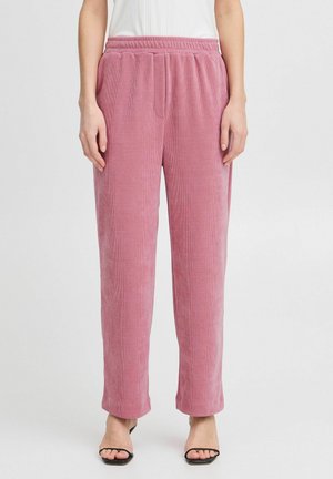 Roze corduroybroek met een relaxte pasvorm, elastische tailleband en zijzakken. De stof heeft een gestructureerd, ribbelpatroon.