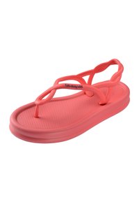 Sandale en caoutchouc rose corail avec semelle texturée et plusieurs fines lanières, dont une entourant la cheville, marquée "havaianas" sur la lanière avant.