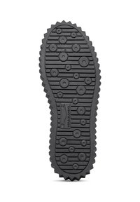 Black rubber shoe sole with a textured pattern of circles and ridges, featuring a serrated edge and an embossed logo in the center.