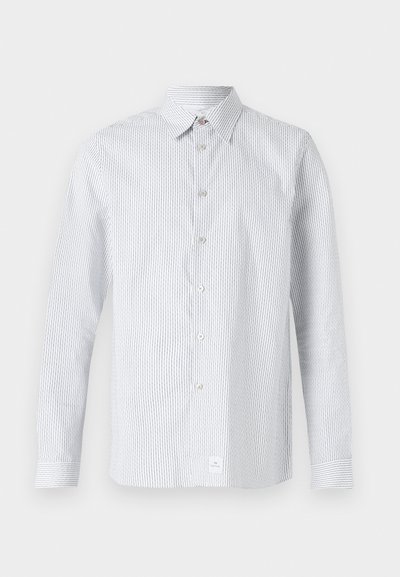Csíkos gombos ing világoskék és fehér színben. Klasszikus gallérral, hosszú ujjakkal és egy kis logóval ellátott címkével a szegélyen.
