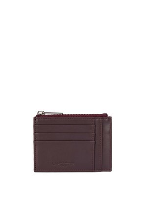 Small dark brown leather cardholder with four card slots, a zippered coin pocket, and embossed brand name "Lancaster" on the front.