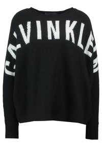 Svart tröja med lös passform, med stora vita "CALVIN KLEIN"-bokstäver över framsidan. Mjuk, texturerad tyg och vida ärmar.