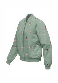 Zielona kurtka bomber z przednim zamkiem błyskawicznym i małymi, haftowanymi różowymi, żółtymi i niebieskimi wzorami kwiatowymi rozmieszczonymi na całej tkaninie.