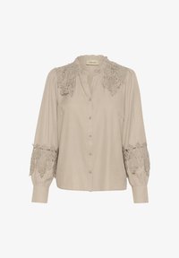 Sélectionné, string