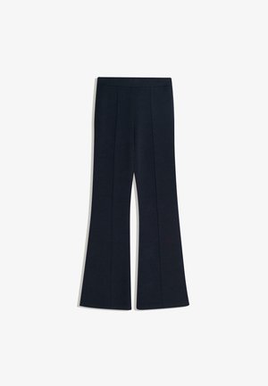 Námornícka modrá dámske rozšírené nohavice s prednými vertikálnymi švami a priliehavým vysokým pásom na bielom pozadí.