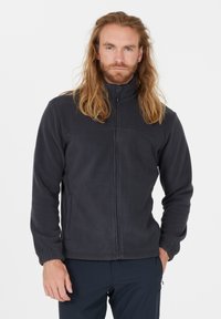 Mørkegrå fleecejakke med lynlås foran, høj krave og elastiske manchetter. Har to sidelommer og en glat overflade.