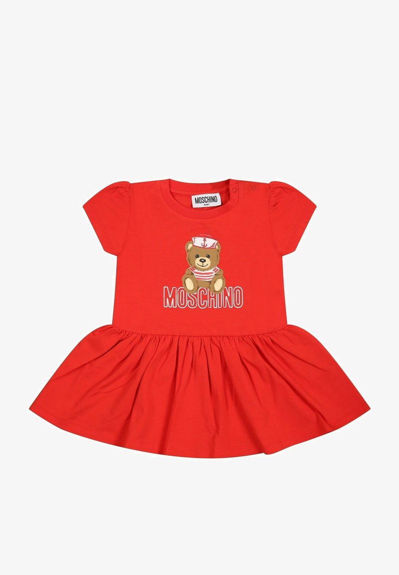Robe bébé rouge à manches courtes, avec un motif d'ours marin et le texte "Moschino" sur la poitrine.