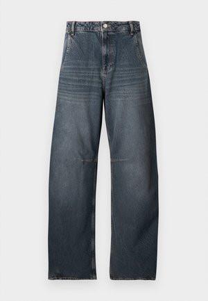 Σκούρο μπλε τζιν παντελόνι με ψηλή μέση και φαρδιά μπατζάκια, με κλείσιμο με κουμπιά και φερμουάρ στο εμπρός μέρος, πλαϊνές τσέπες και ορατές ραφές στα γόνατα.