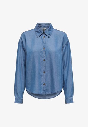 Valkoinen denim-paita, jossa on napit edessä, klassinen kaulus, pitkät hihat ja kaareva helma. Sisältää ruskeat napit ja rento istuvuus.