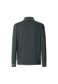 Tumši pelēks long-sleeve adīts džemperis ar augstu apkakli, ribotām aprocēm un apakšmalu, ar smalku teksturētu materiālu un mazu logotipu uz piedurknes.