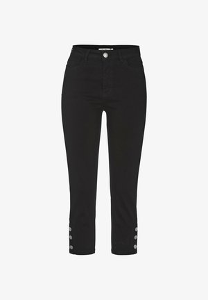 Musta korkeavyötäröiset slim-fit-housut, joissa edessä nappi ja vetoketju, vyölenkit, etu- ja takataskut sekä kolme nappia jokaisessa nilkassa.