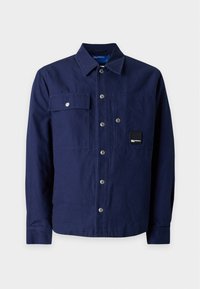 Nevybrané, peacoat