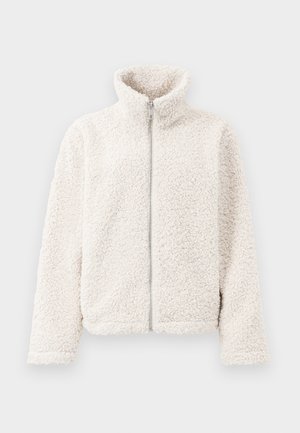 Fleecejakke i off-white, med høy krage, frontglidelås og strukturert, myk stoff med lange ermer og elastiske mansjetter.