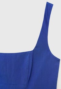 Sleek blue dress with a square neckline and slim straps. Made from smooth fabric, it features a structured bodice and a subtle texture.