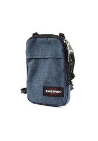 Borsa a tracolla in tessuto blu con cerniera nera e patch del logo. Presenta un compartimento principale e una tasca frontale, con una forma rettangolare.