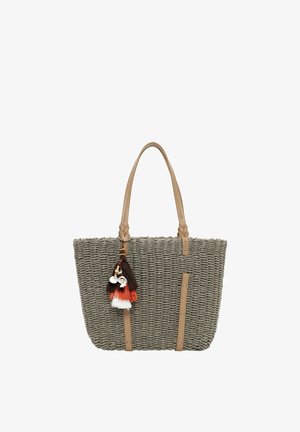 Sac cabas gris tissé avec anses et garniture en cuir couleur tan, orné d'un pompon décoratif avec des coquillages et des fils multicolores.