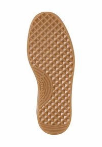 Semelle en caoutchouc beige avec une surface texturée à motif en losange. Présente des bords arrondis et un logo en relief près du talon.