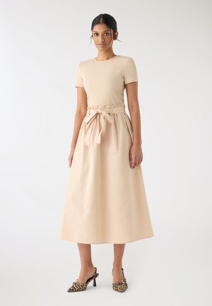 Vestito di maglina - beige chiaro