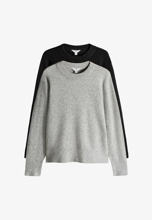 Kaks kampsunit virnas: üks helehall, teine must. Mõlemal on ümmargune kaelus, pikad varrukad ja pehme, tekstureeritud kangas.